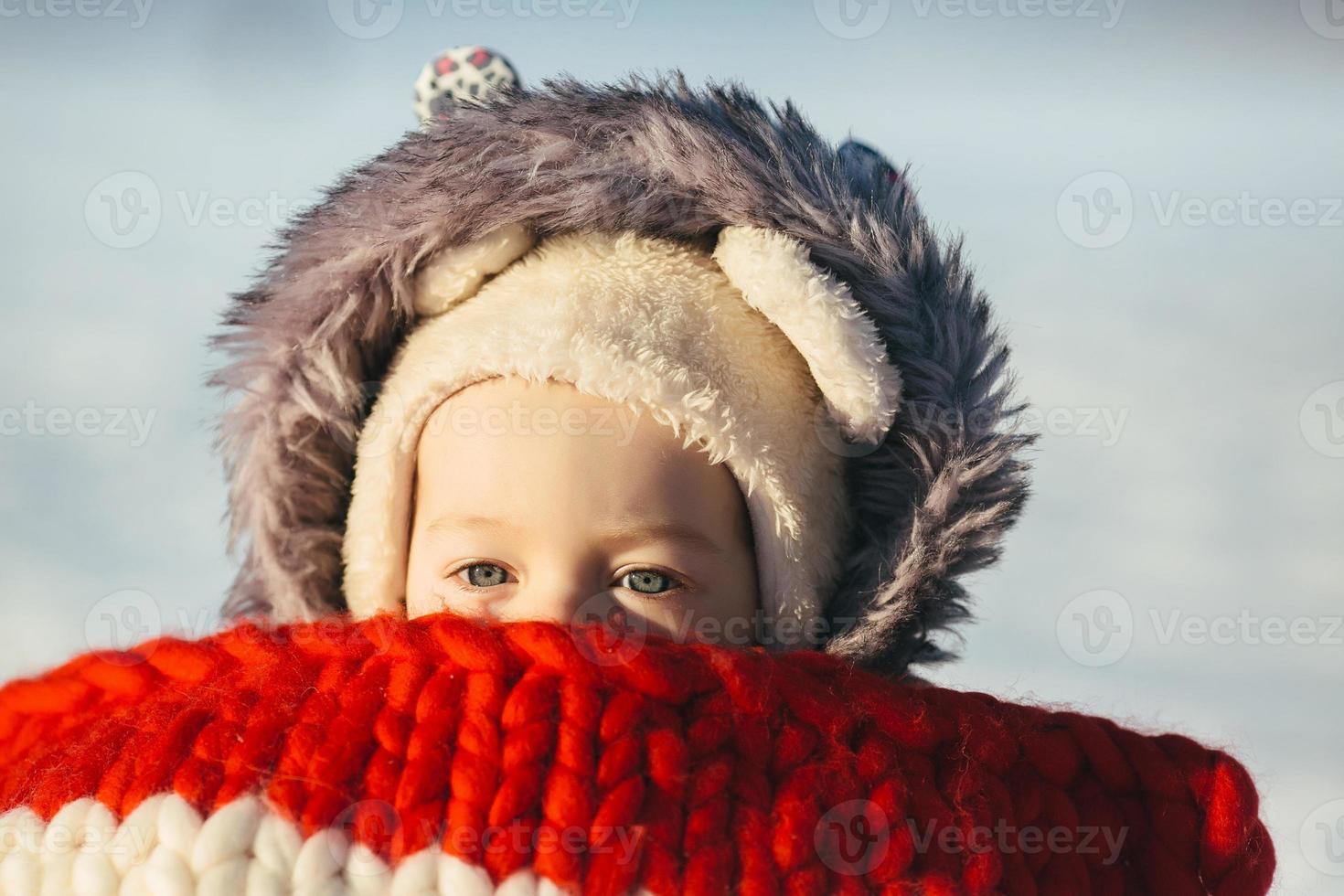 Little girl child sitting on sledges photo