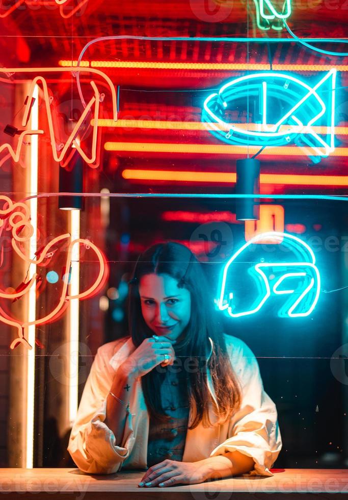 Beautiful girl in a window cafe photo