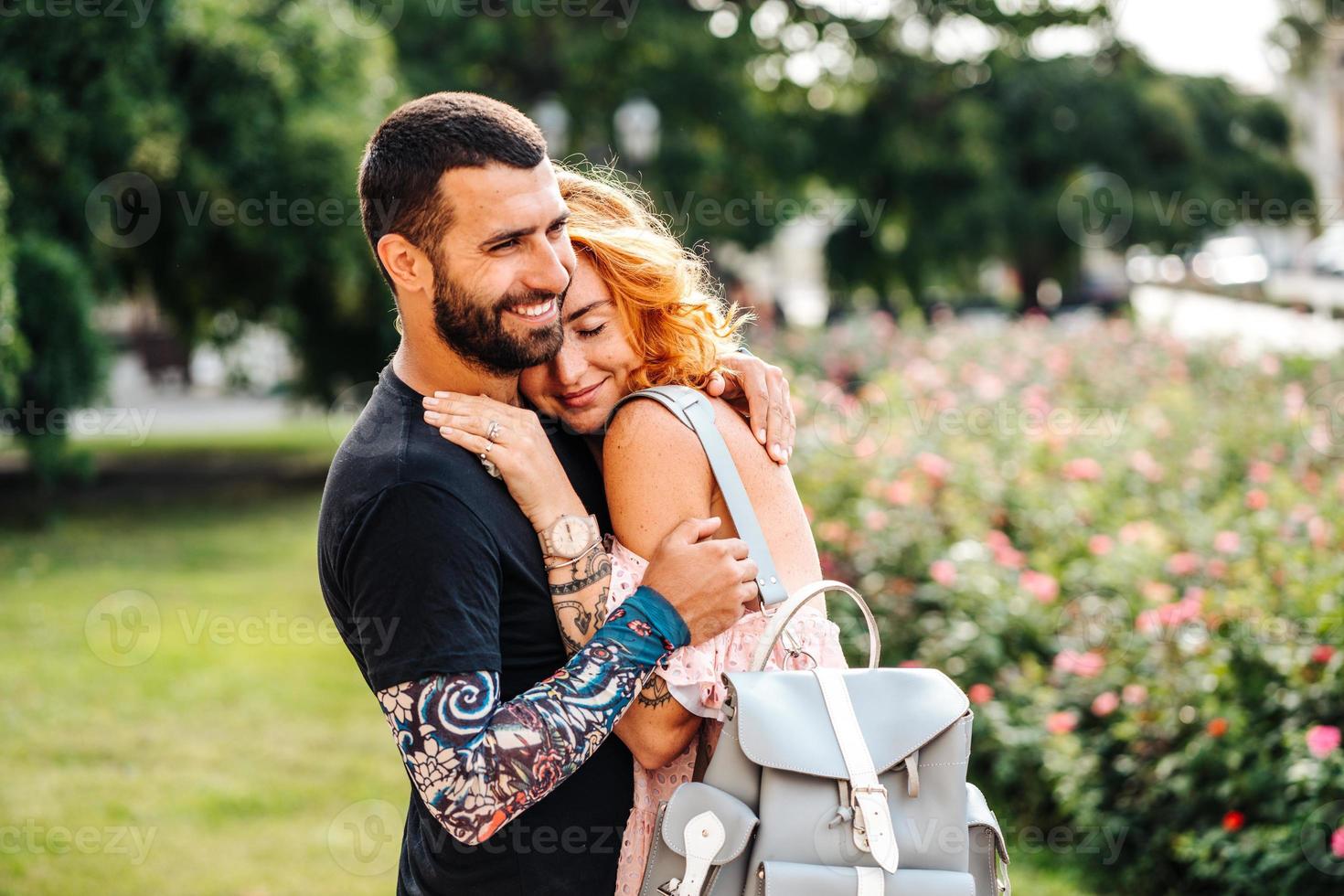 Cute couple in summer park photo