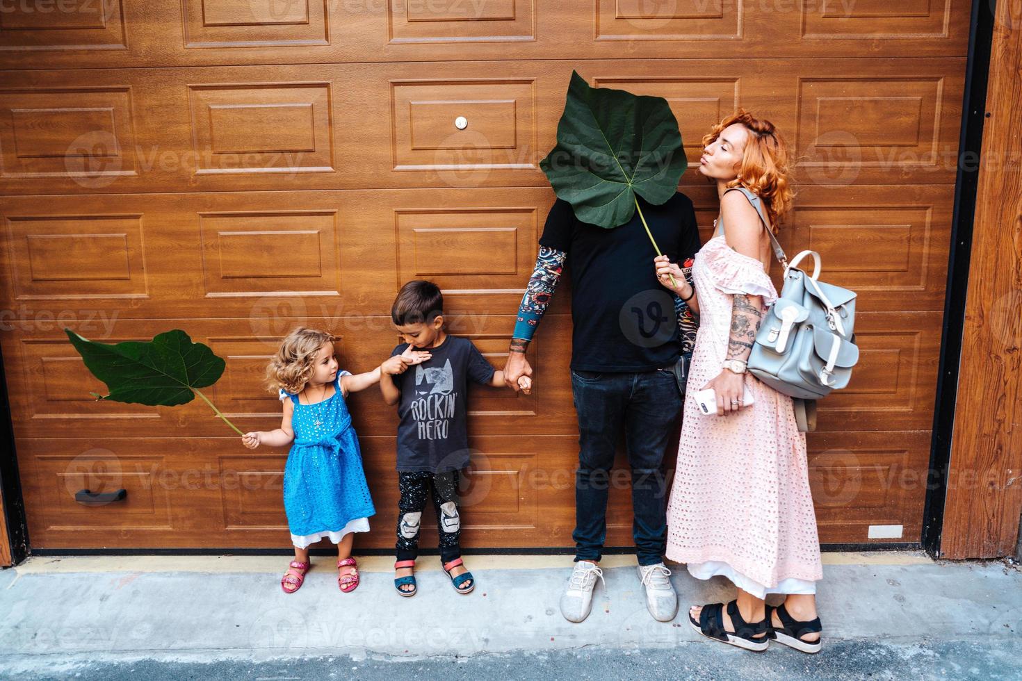 Family having fun on the street photo