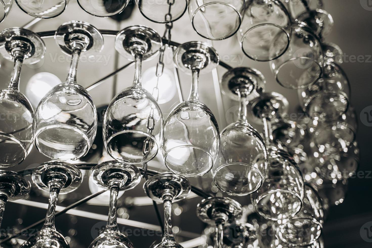 Beautiful chandelier made with glasses of wine photo