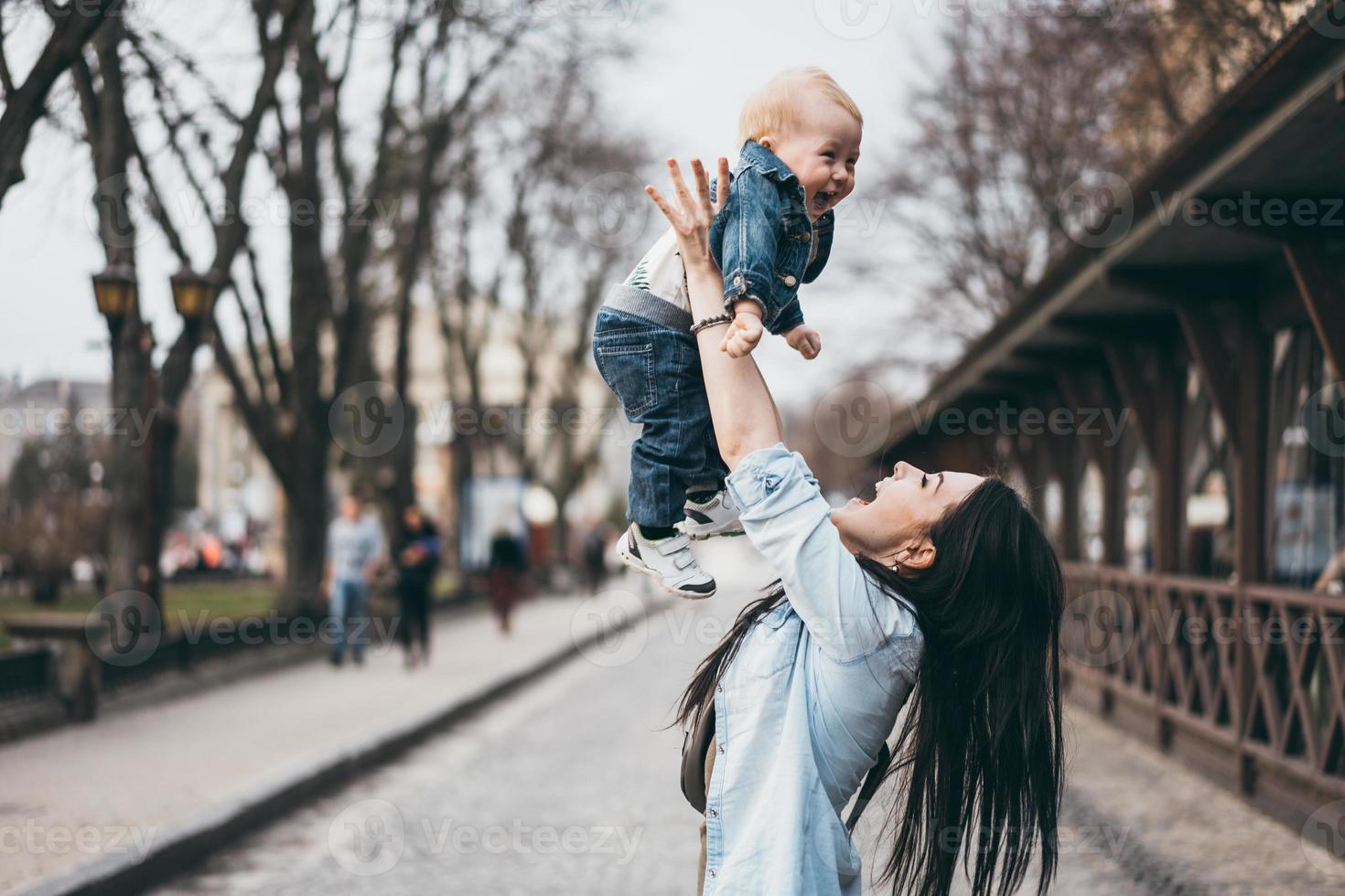 Young mother with her baby boy photo