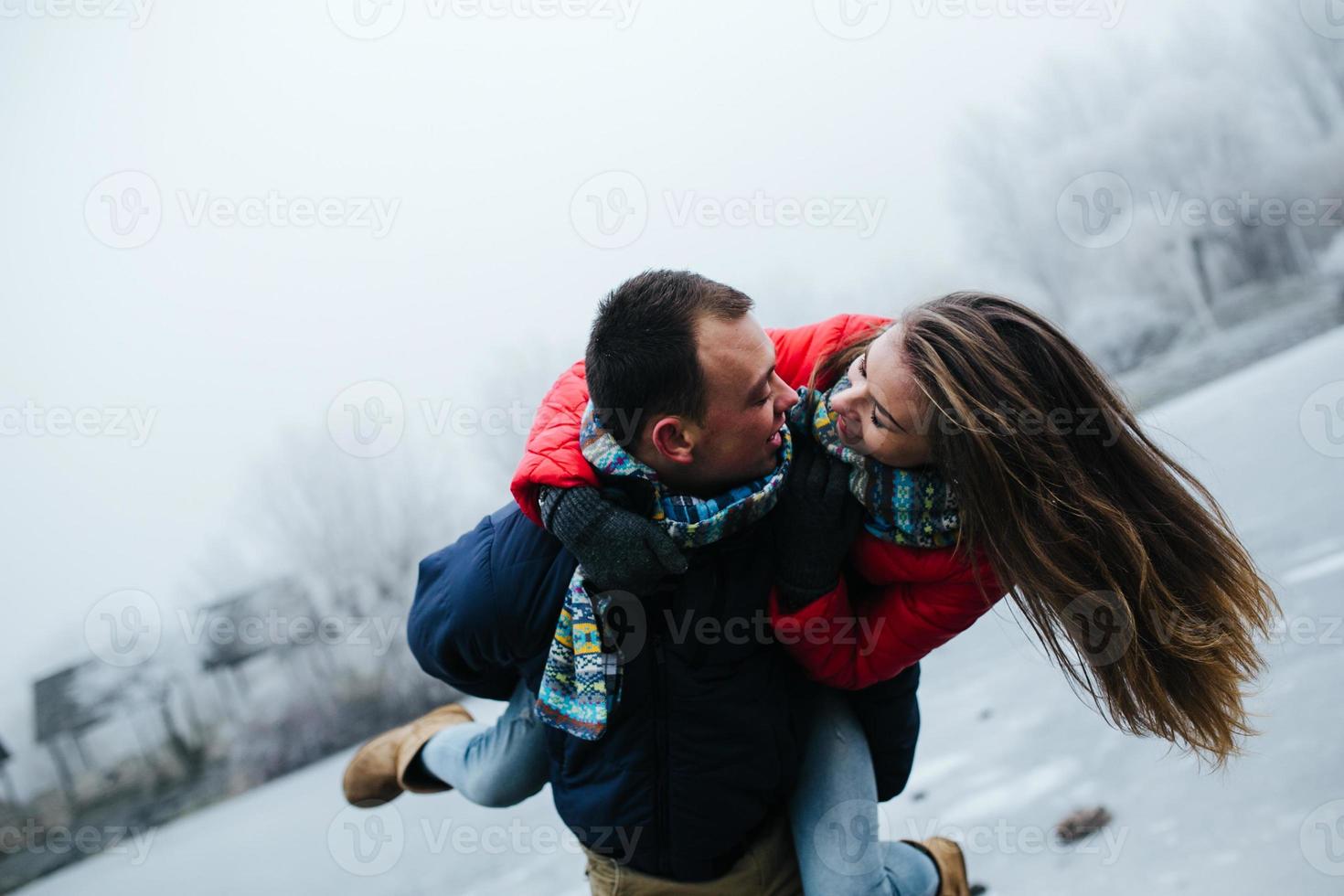 Young beautiful couple having fun photo