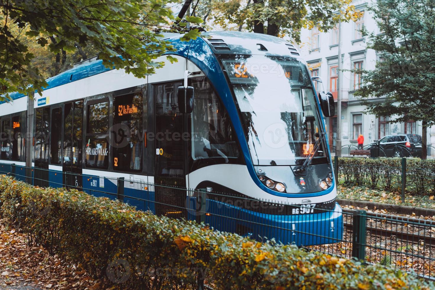 Blue city trams in the autumn city. photo