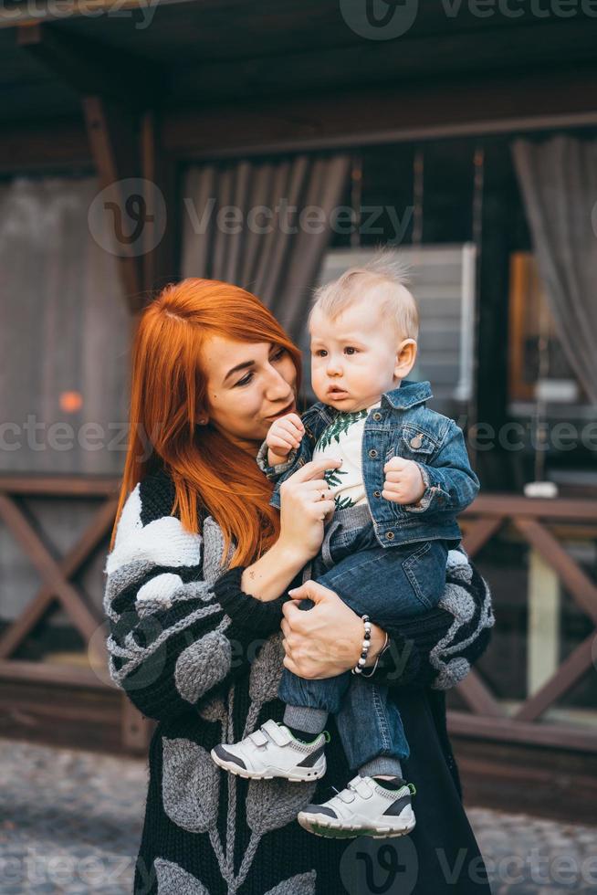 Young mother with her baby boy photo