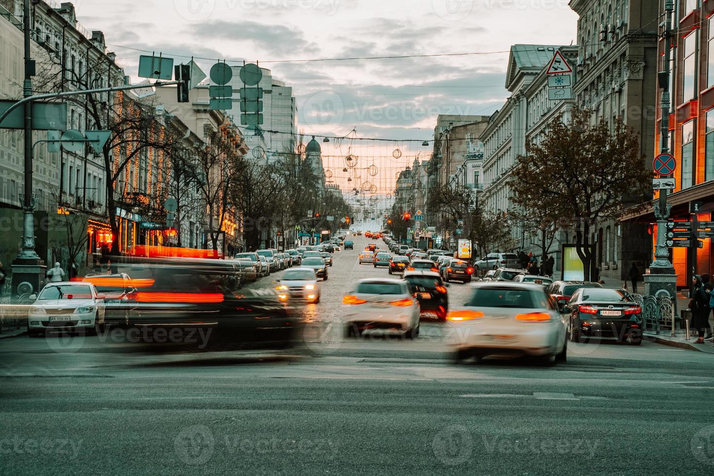 KIEV, UKRAINE - APRIL 14, 2019 Night view of the streets of Kiev. Urban fuss. Bogdan Khmelnitsky Street photo