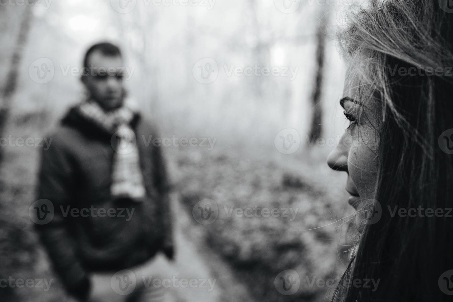 couple walking on a winter park photo