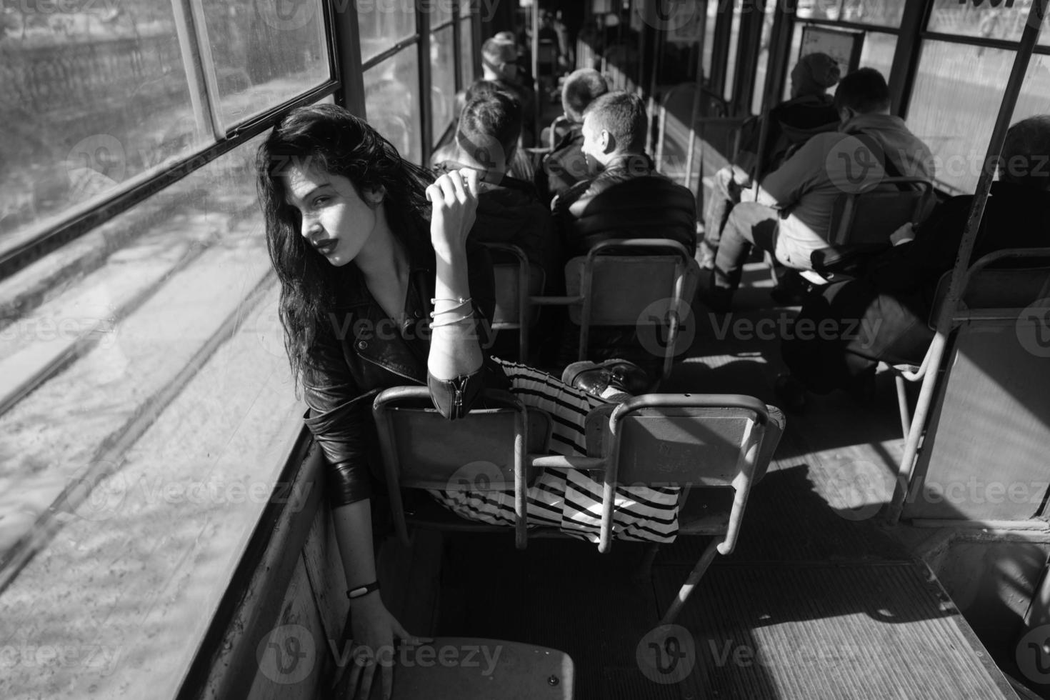 Woman traveling inside the tram photo