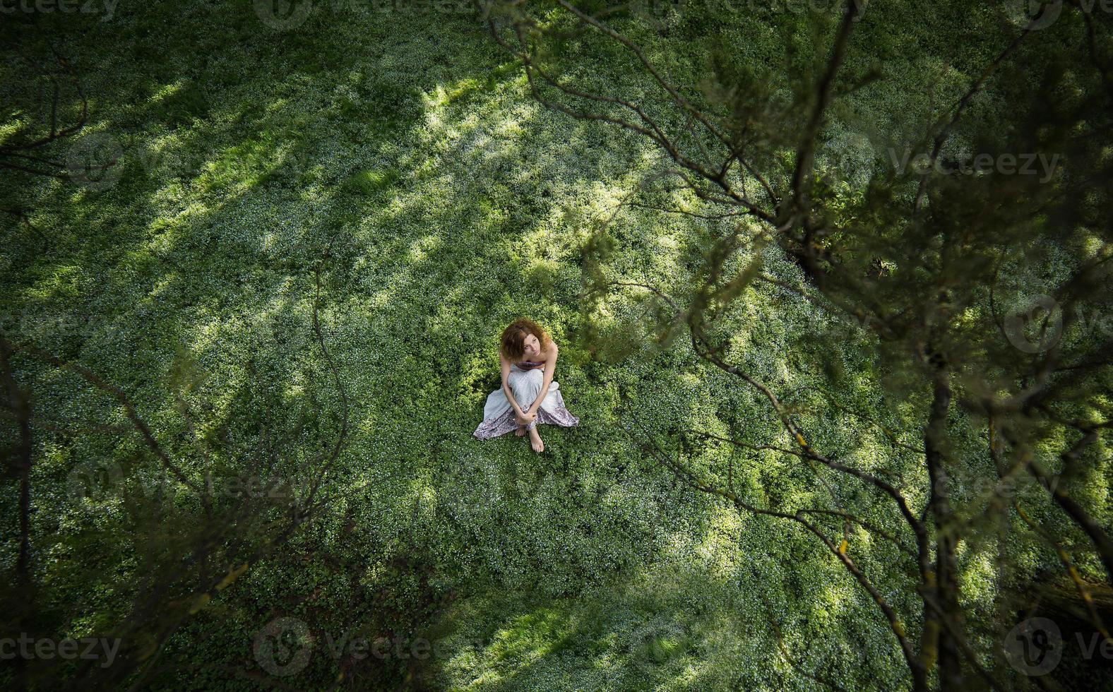 Girl in garden shooted from above photo