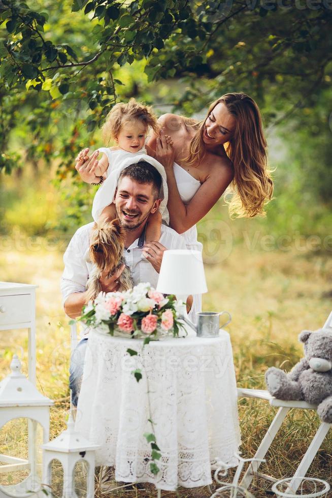 Young family with child at a picnic photo