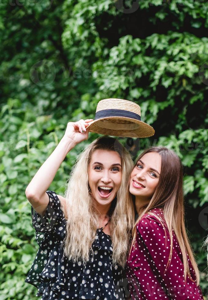 Two girls in a summer park photo