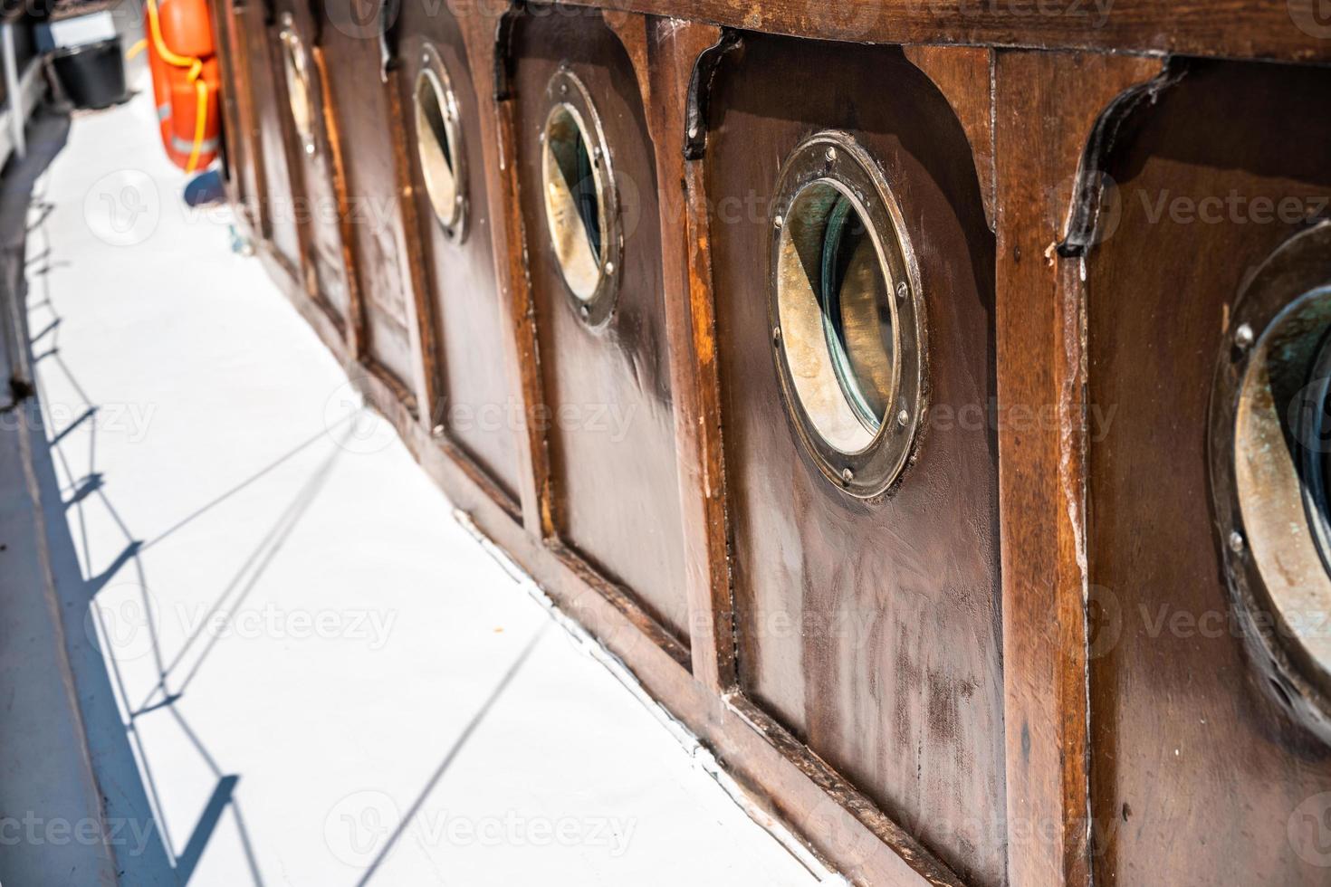 Close board of an old wooden yacht photo