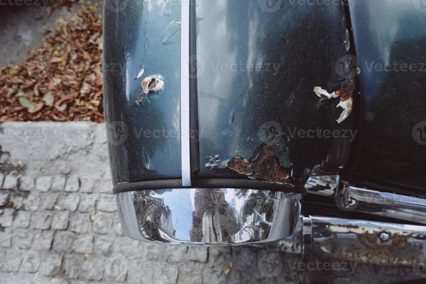 Front headlight of an old soviet automobile gas 21 photo