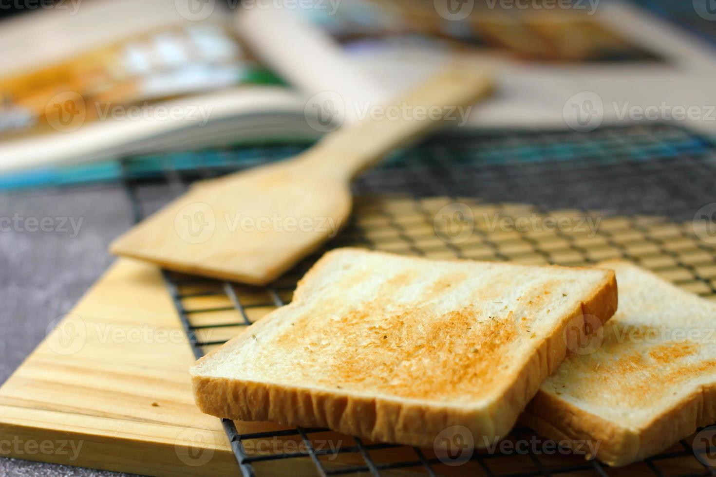 2 freshly made toasts laid out and ready to serve on the table. photo