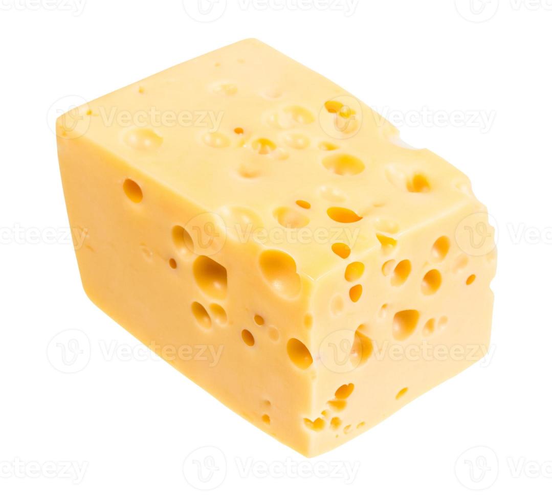 piece of yellow swiss cheese with internal holes photo