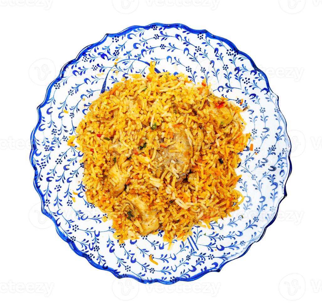 top view of Chicken biryani on plate isolated photo