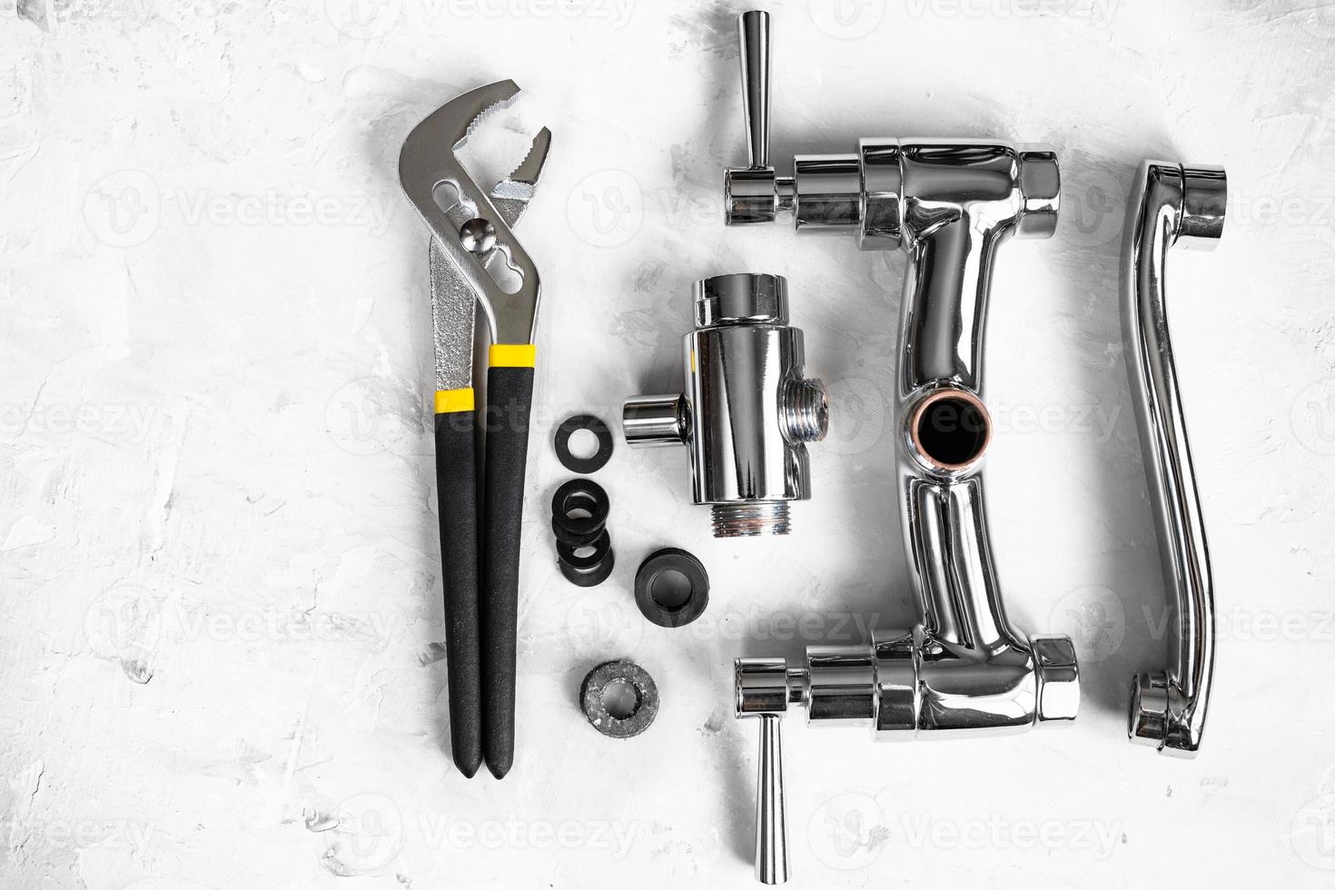top view of wrench, faucet, spout with copyspace photo