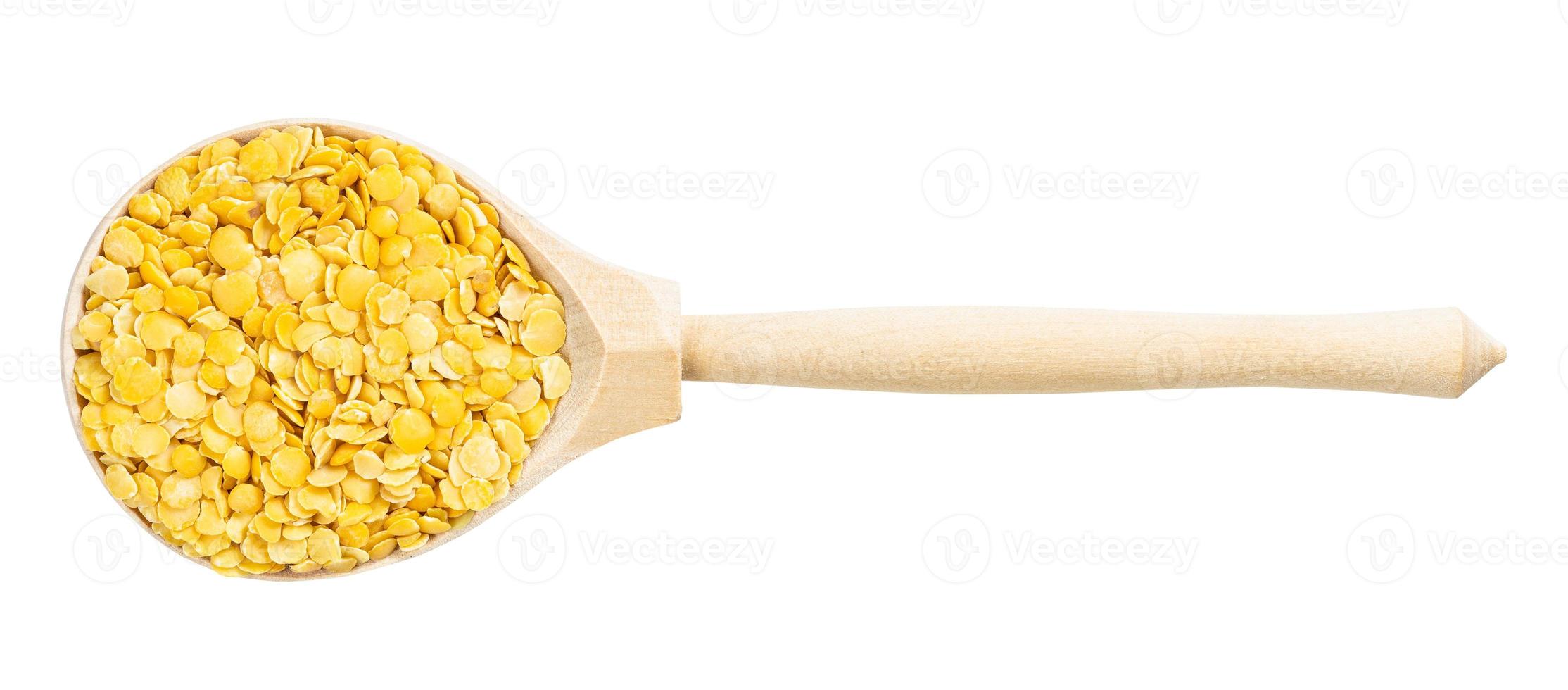 top view of wood spoon with split yellow lentils photo