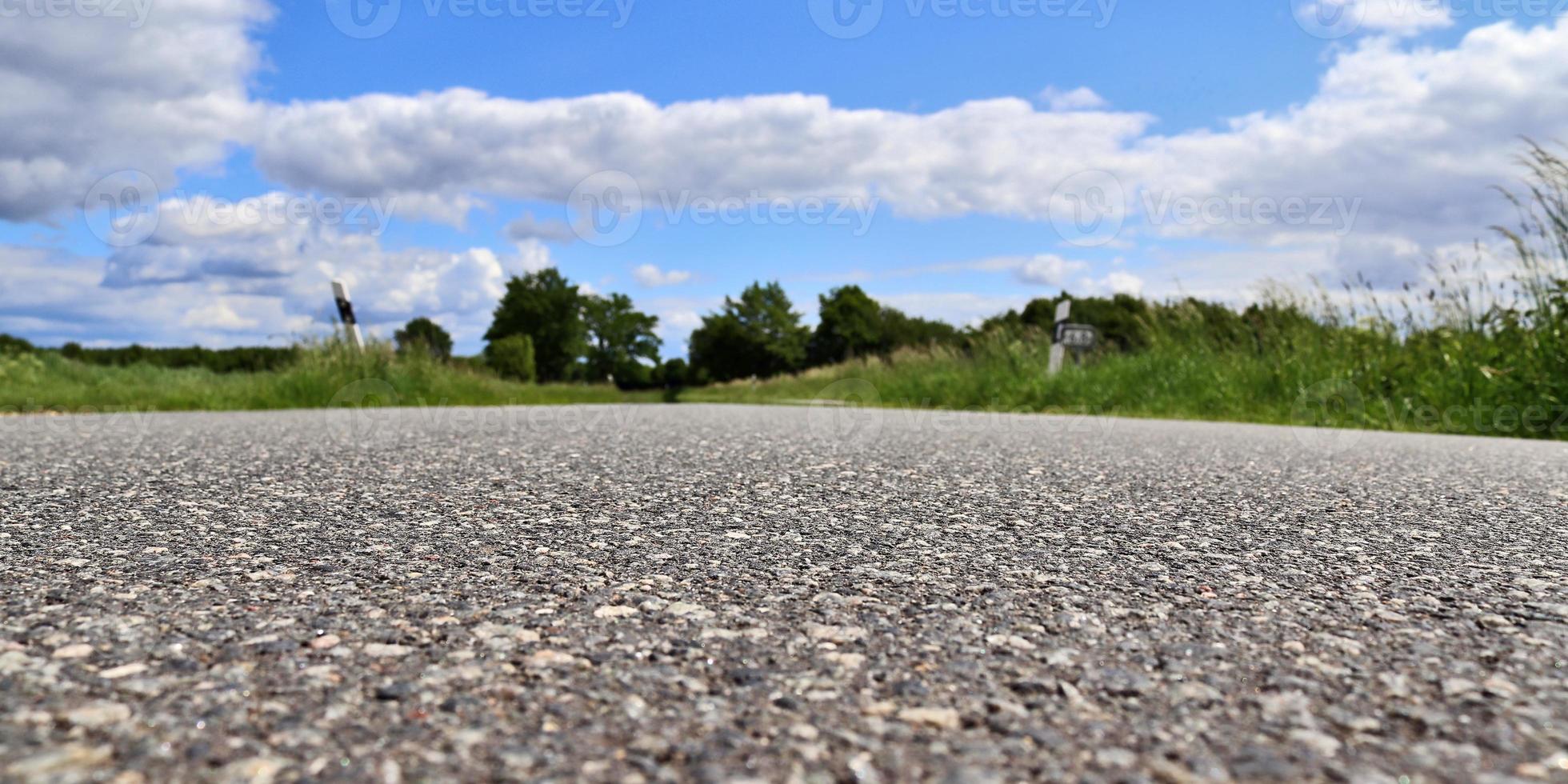 Beautiful view on countryside roads with fields and trees in northern europe photo