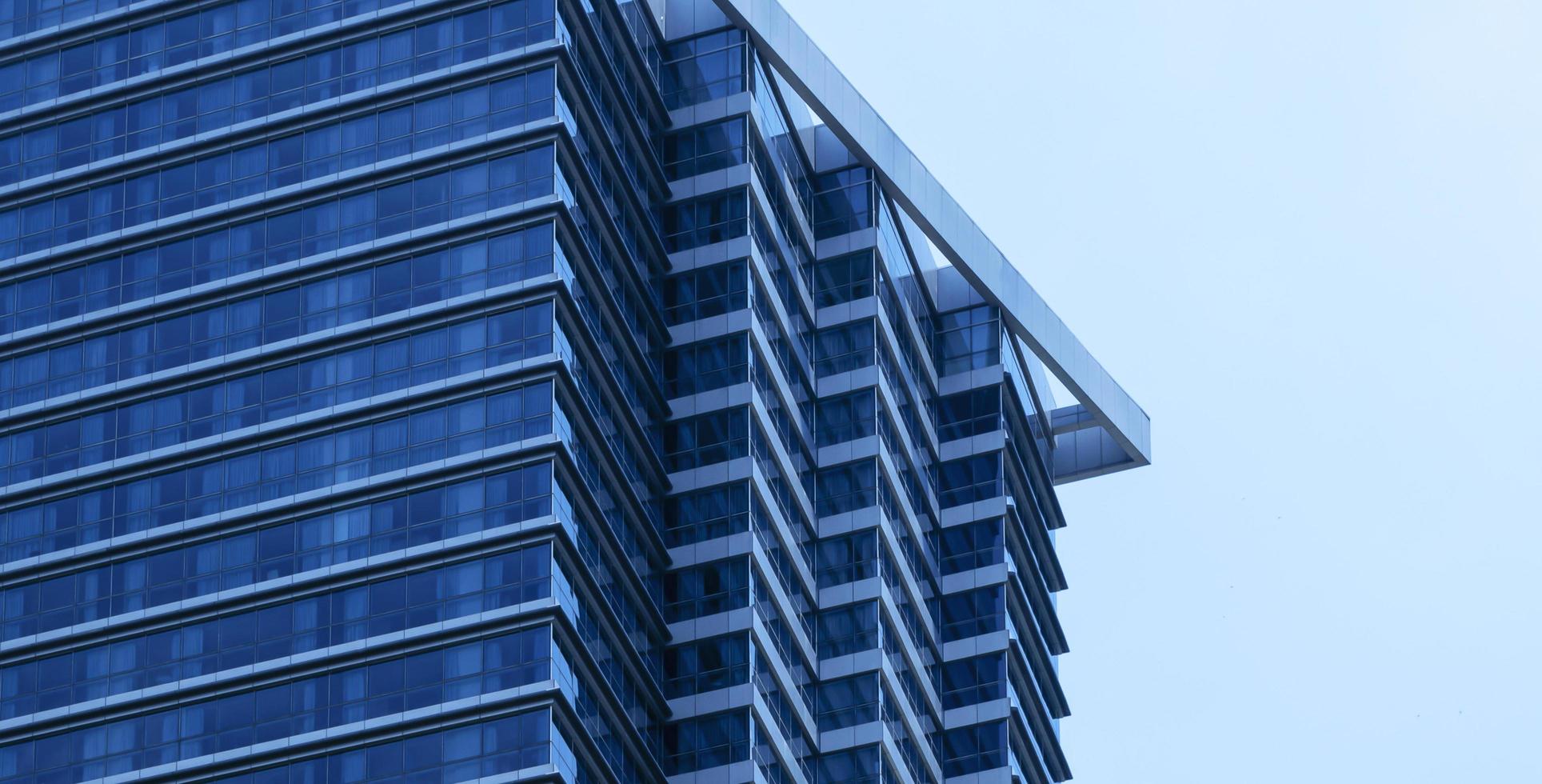 Modern office building with glass window photo