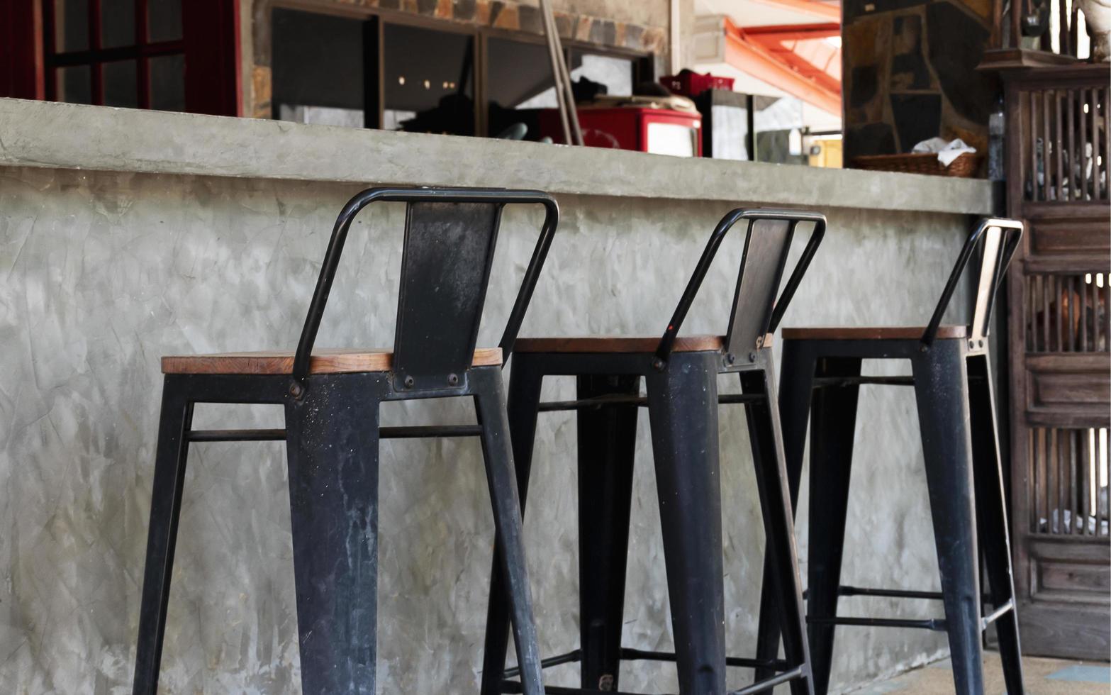Black steel bar stool with counter bar photo