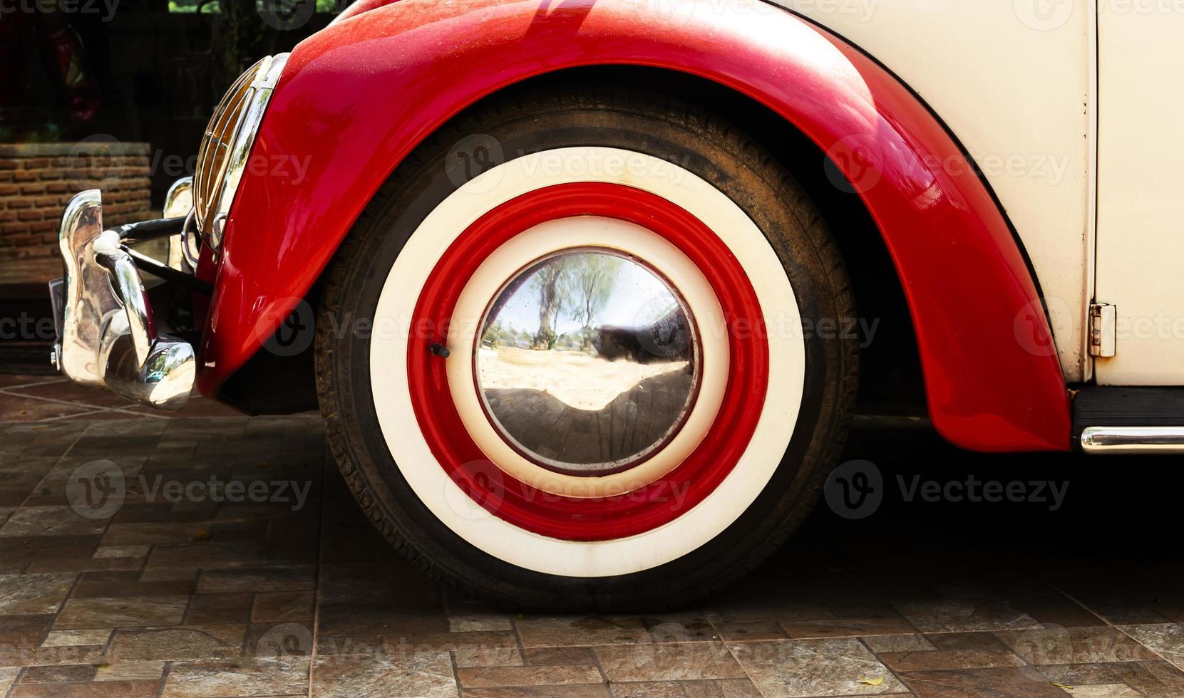 Close up wheel red retro car photo