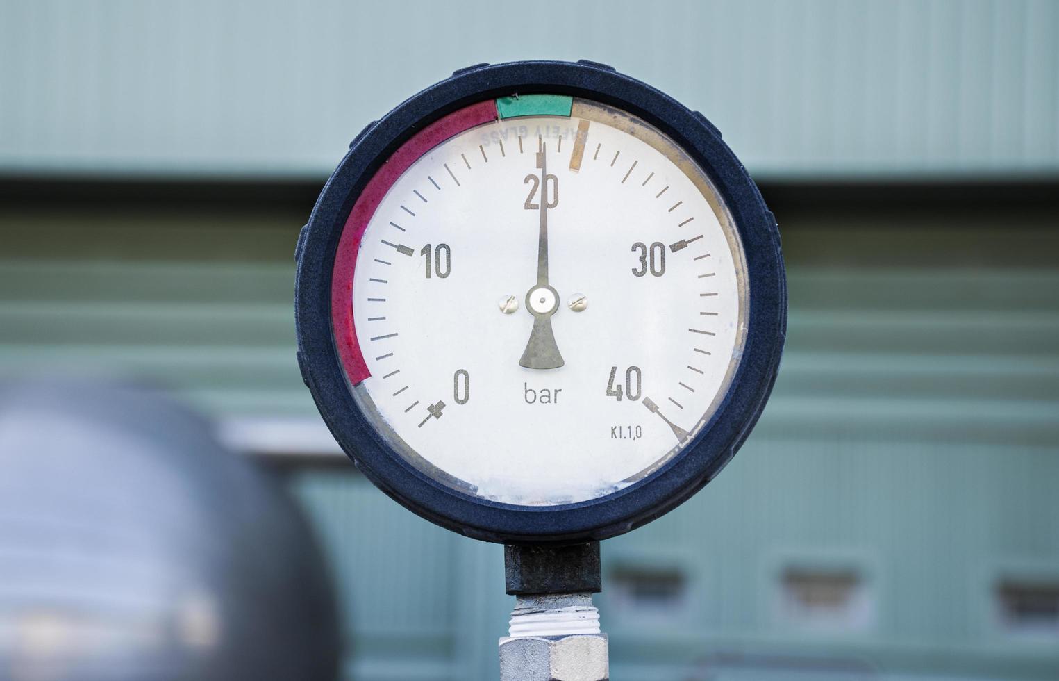 Close up gas pressure meter tubes valves photo