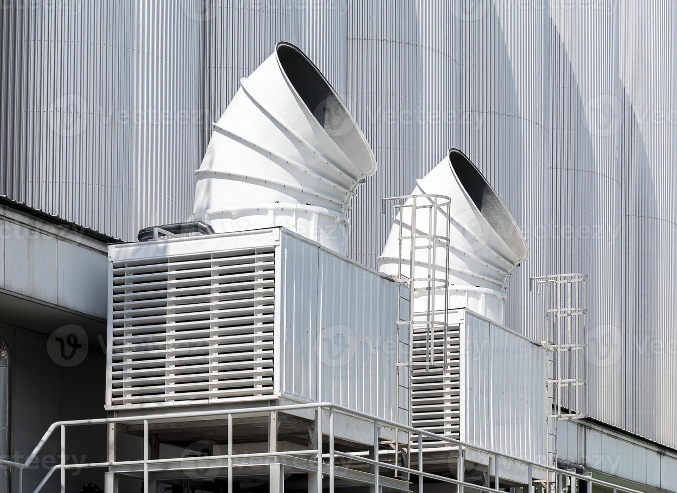 Cooling water tower on rooftop industry plant photo