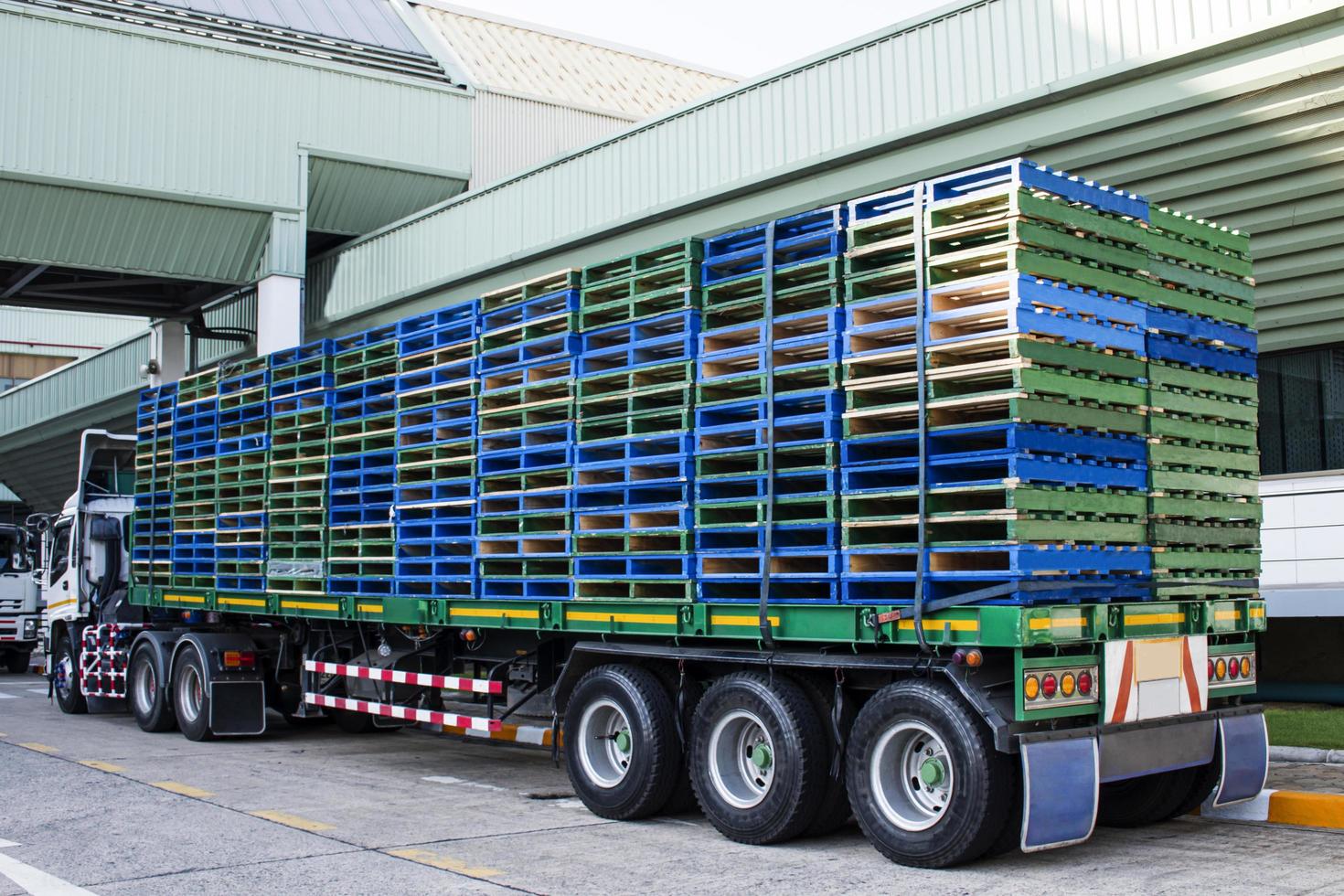 Wooden pallets stacked on trailer photo