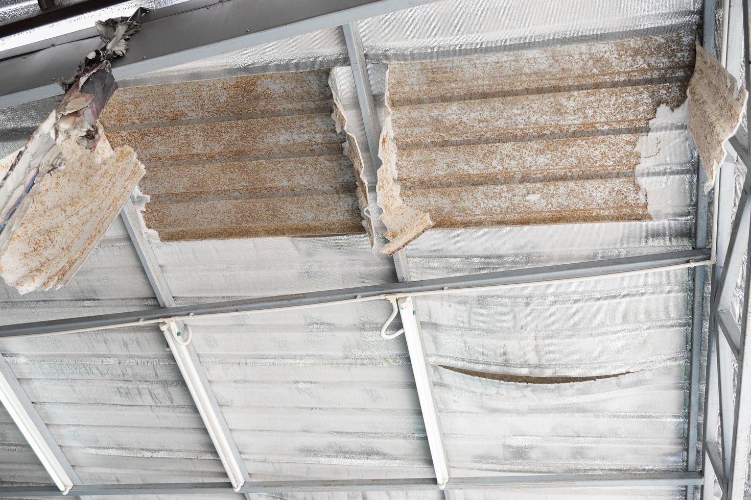 Polyethylene foam expires of metal sheet roof. photo