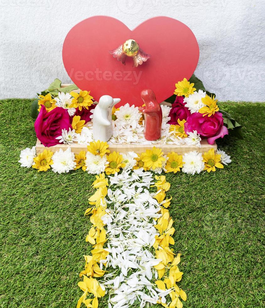 Mock up couple hugging at simulated wedding decorated with roses and flowers. Valentine day concept photo