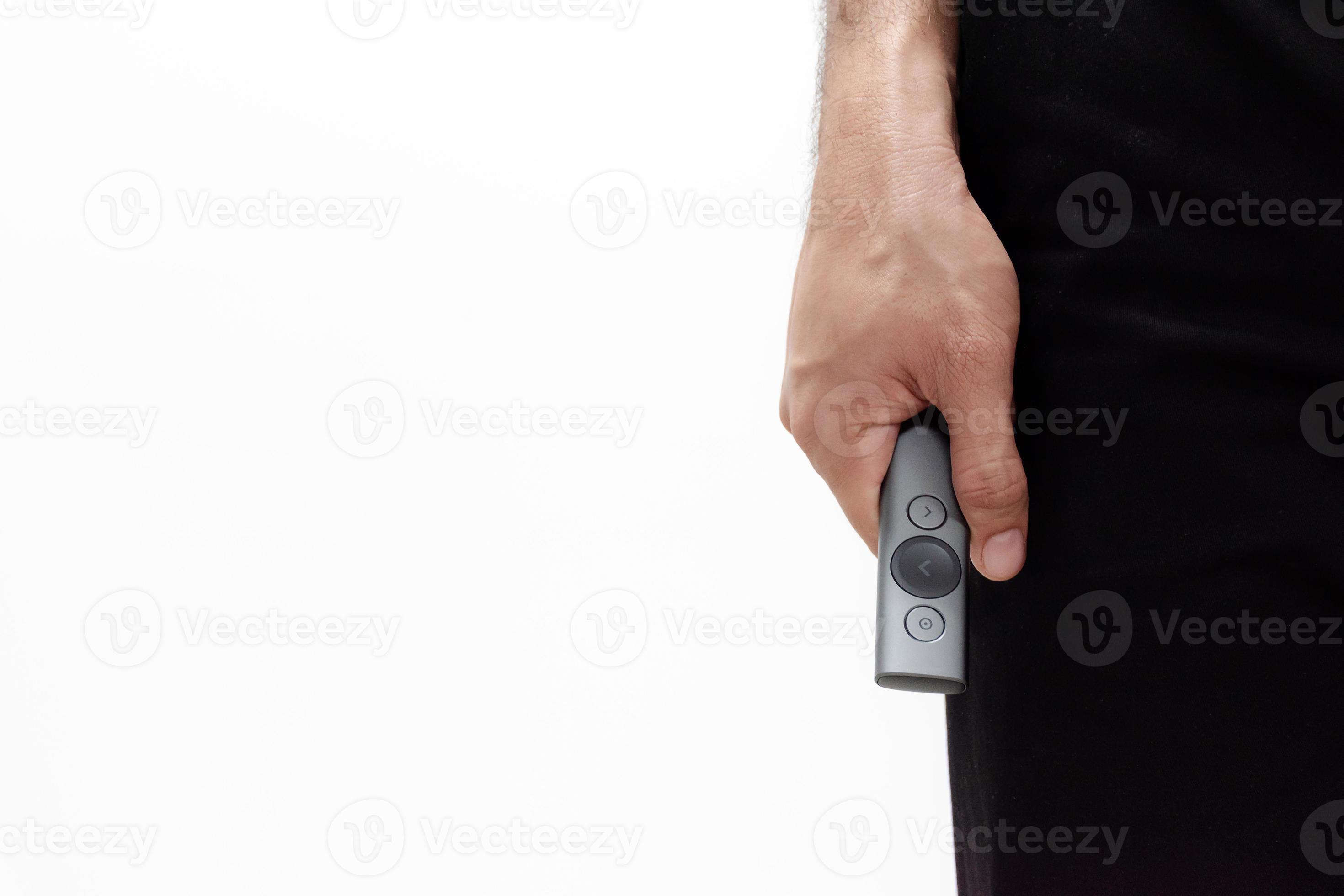 Man with Presentation slide remote control on white background 11375269