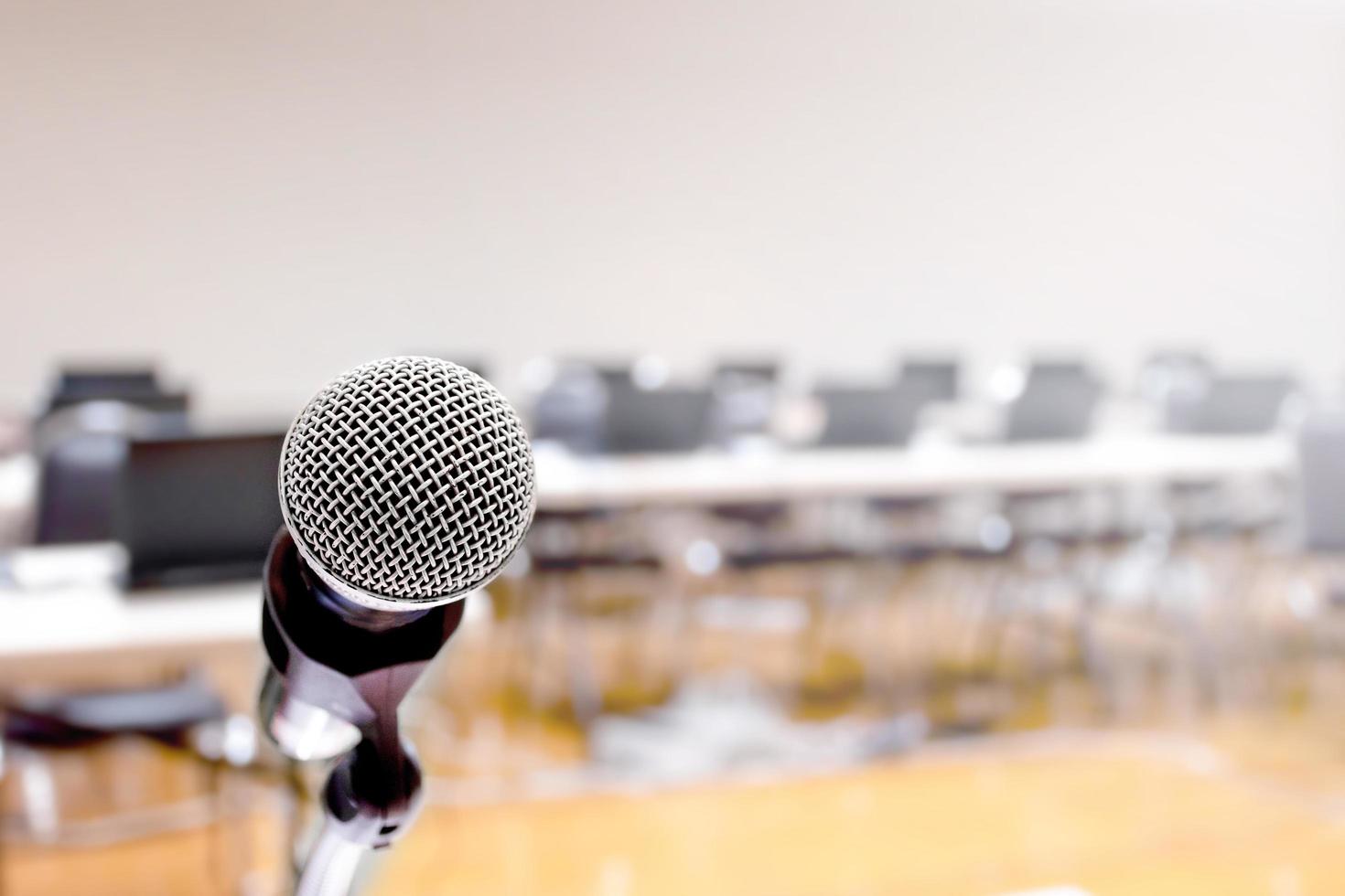 Microphone on stage of speech with copy space in computer classroom photo