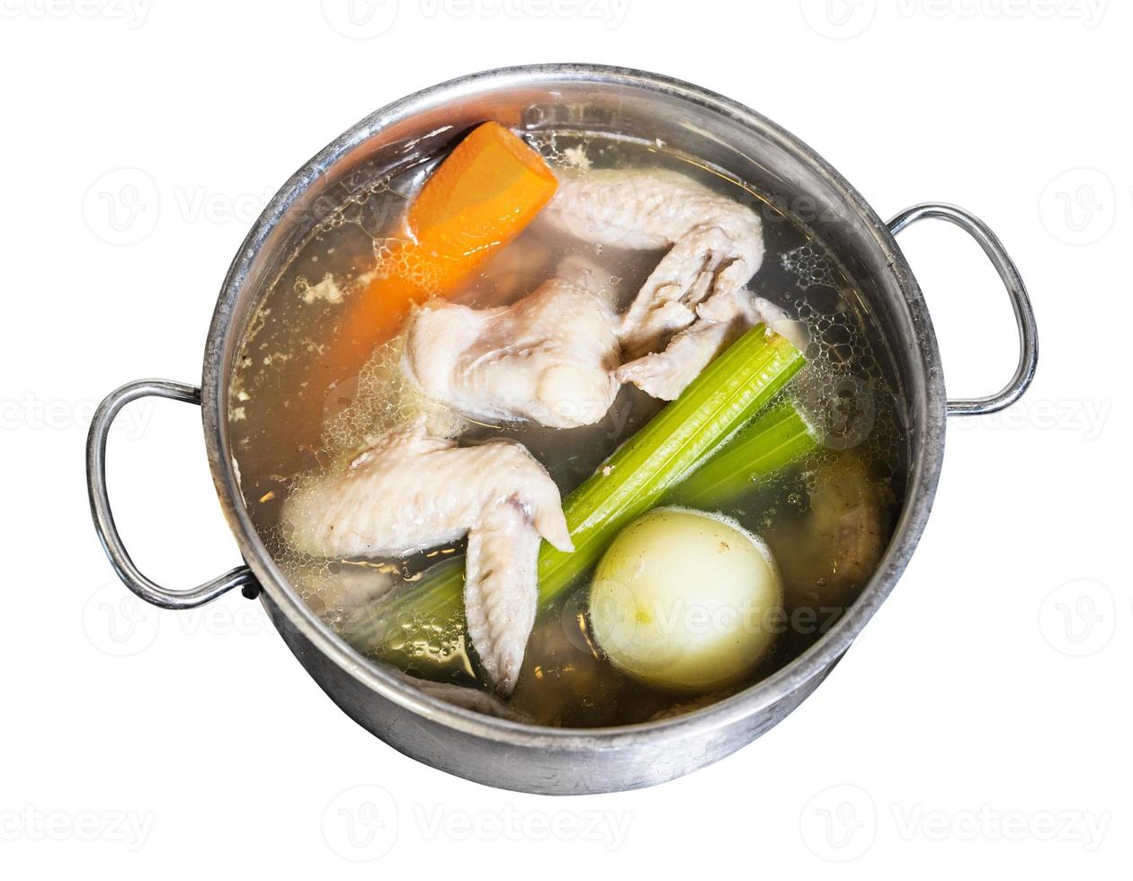 above view of chicken wings broth in pot isolated photo