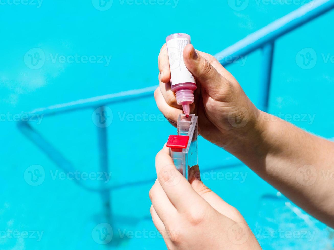 Addition of a reagent to pH meter photo
