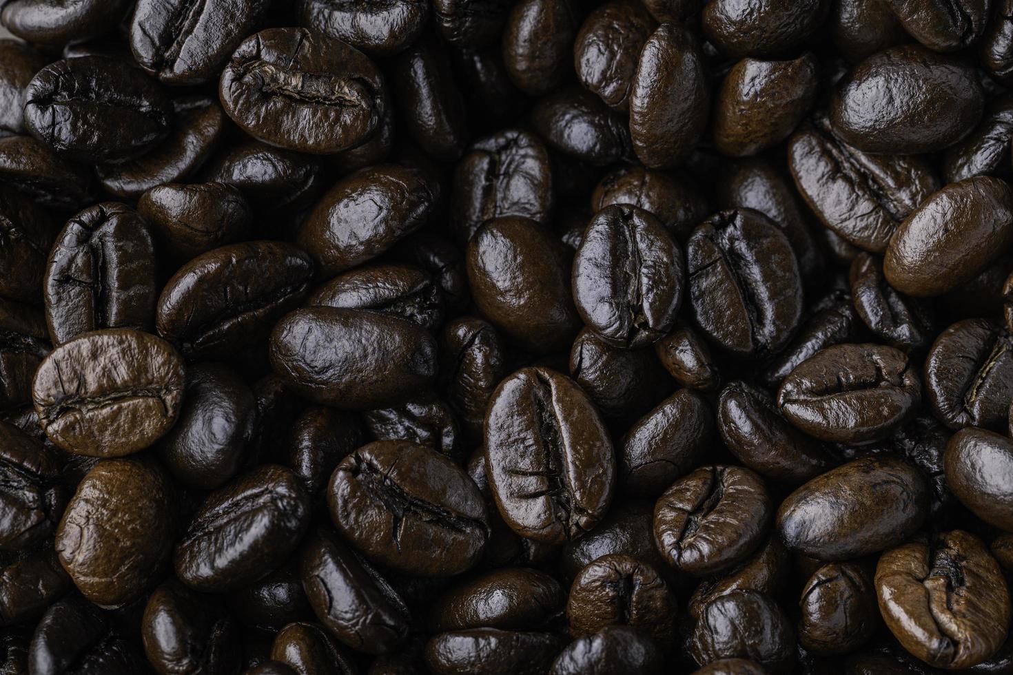 Background of roasted coffee beans. Photo Macro close up.