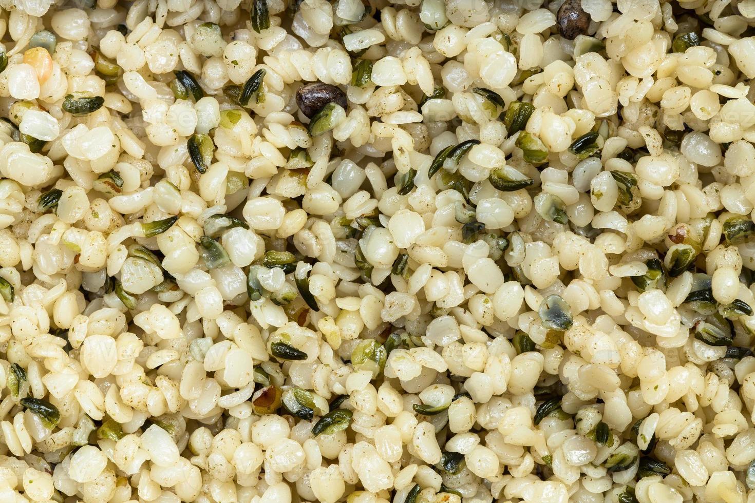 background - many cores of hemp seeds photo