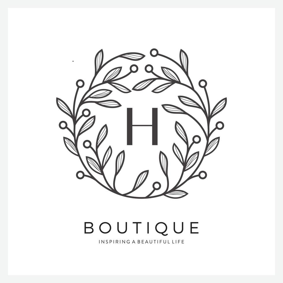 Letter H with premium floral frame for business company vector