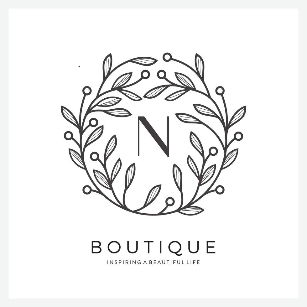 Letter N with premium floral frame for business company vector