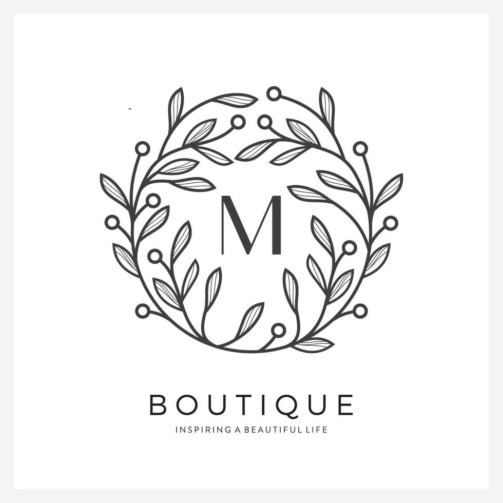 Letter M with premium floral frame for business company vector
