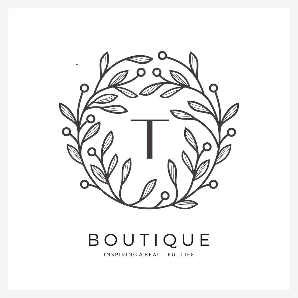 Letter T with premium floral frame for business company vector