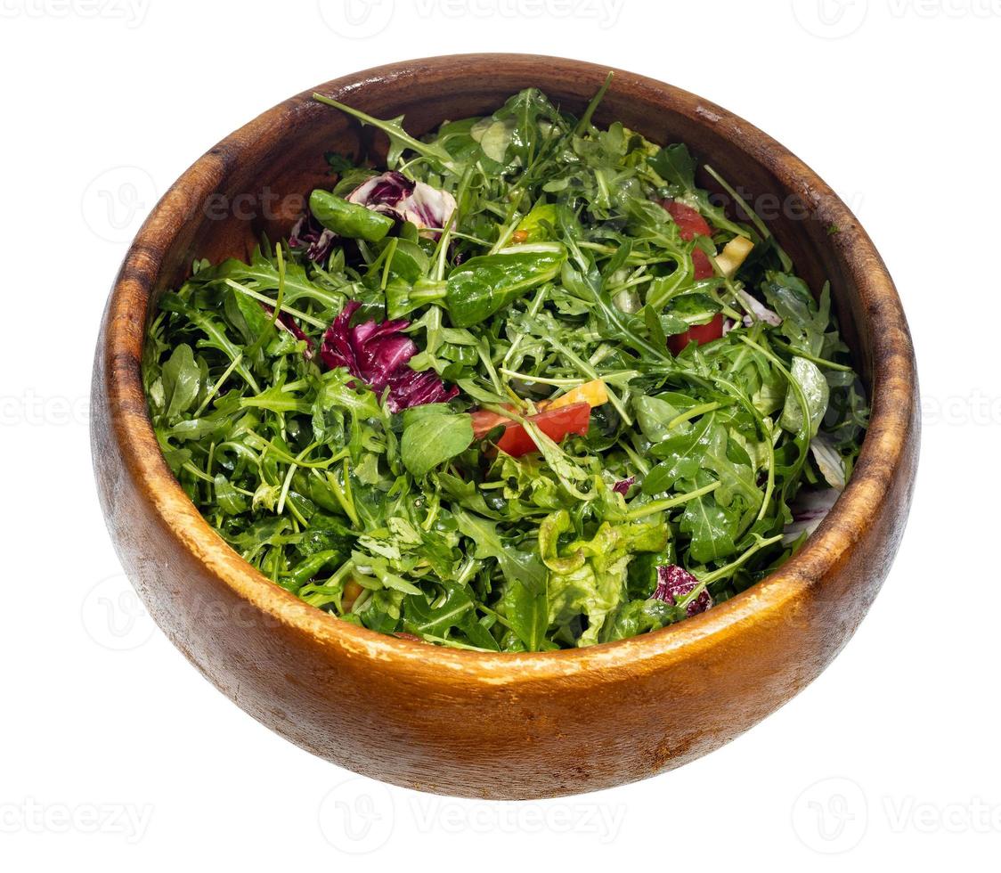 oiled green salad from greens and vegetables photo