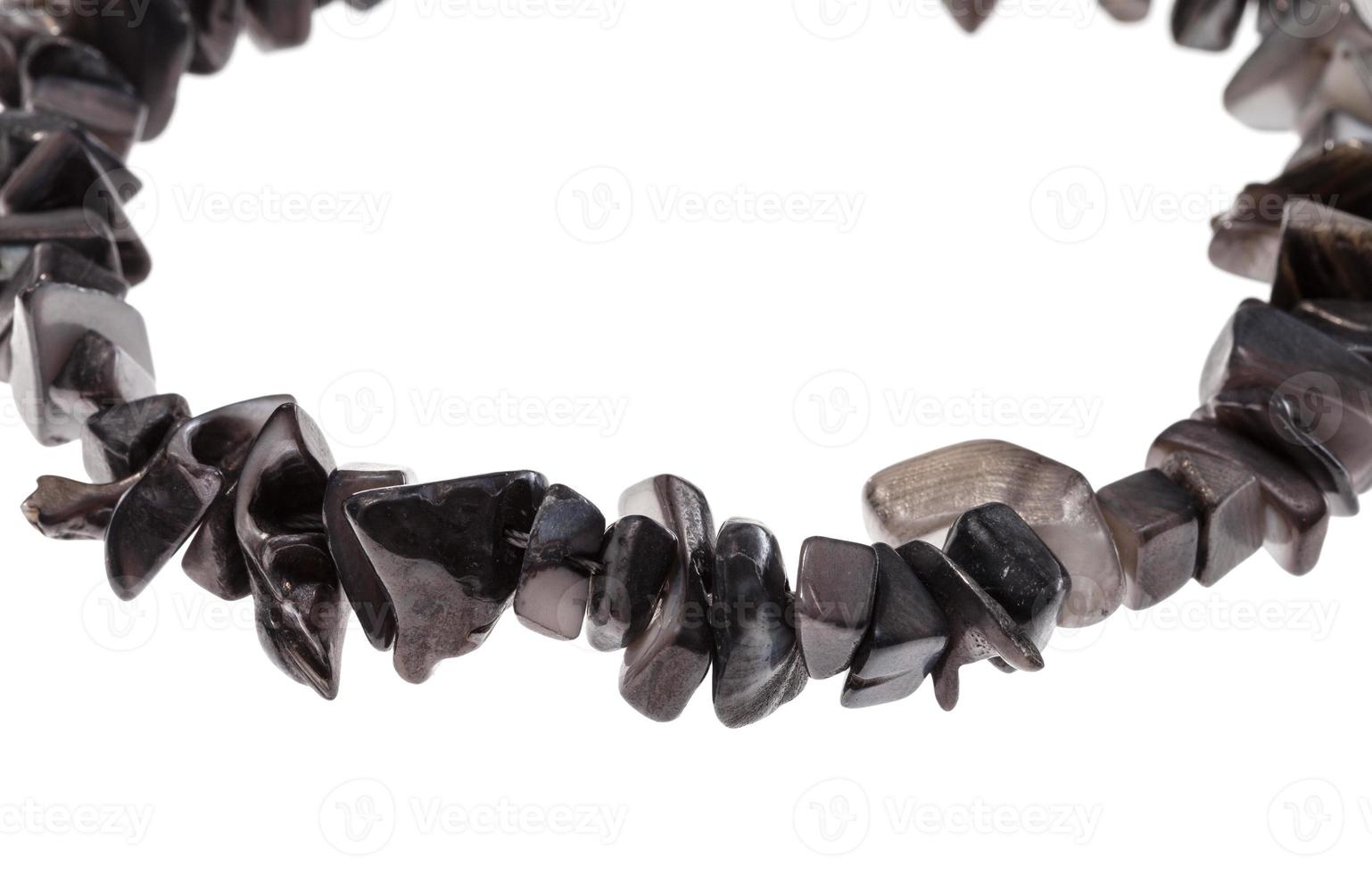 string of beads from natural gray nacre pieces photo