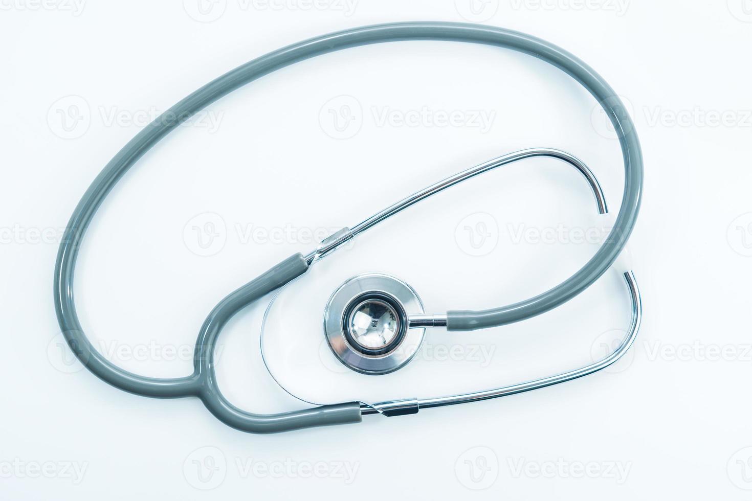 Stethoscope for doctor checkup on table photo