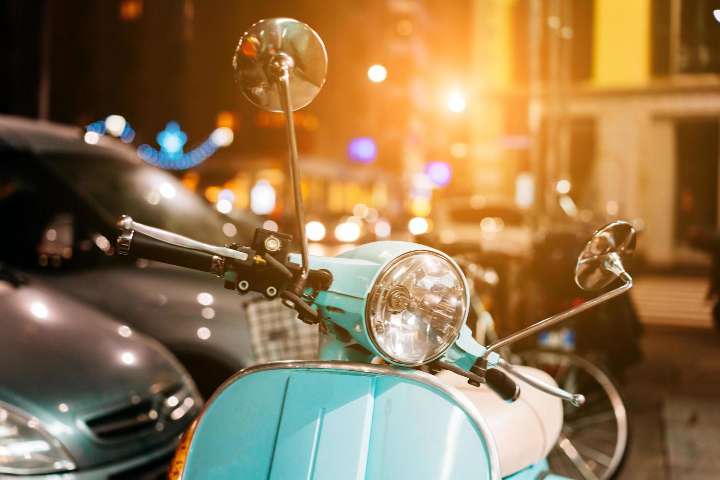 Light blue retro scooter on the street photo