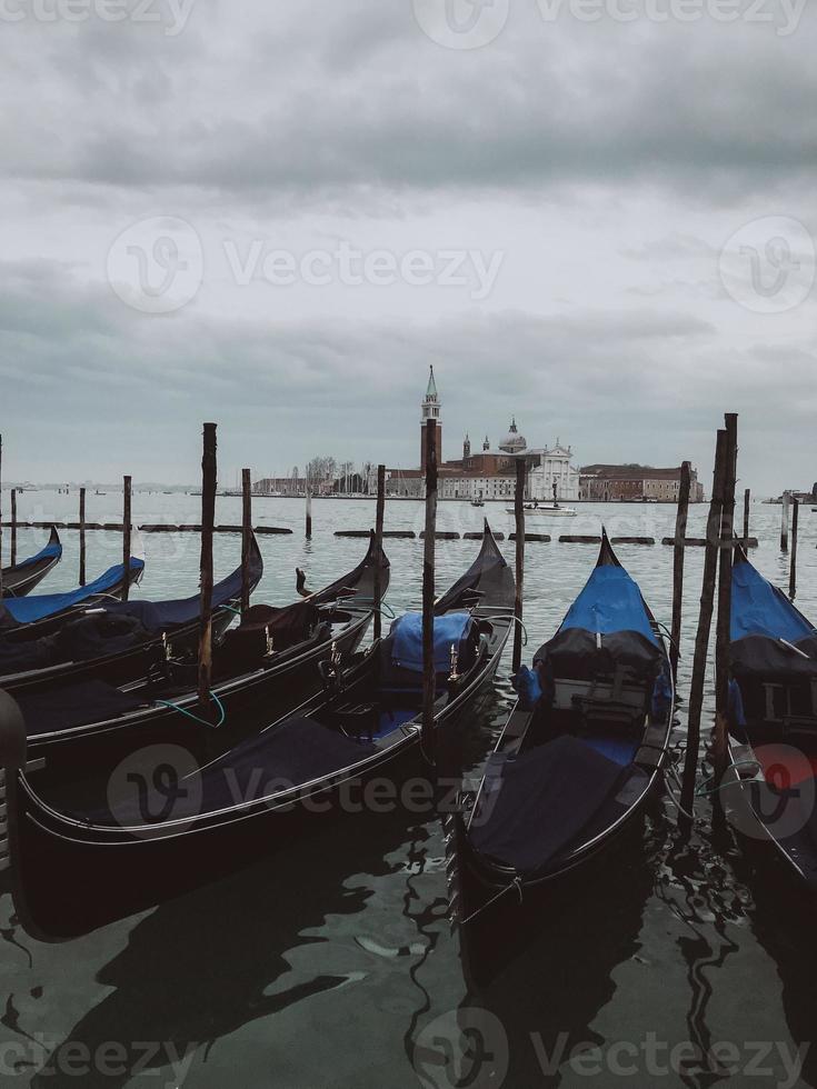 Gondolas moored by Saint Mark square photo