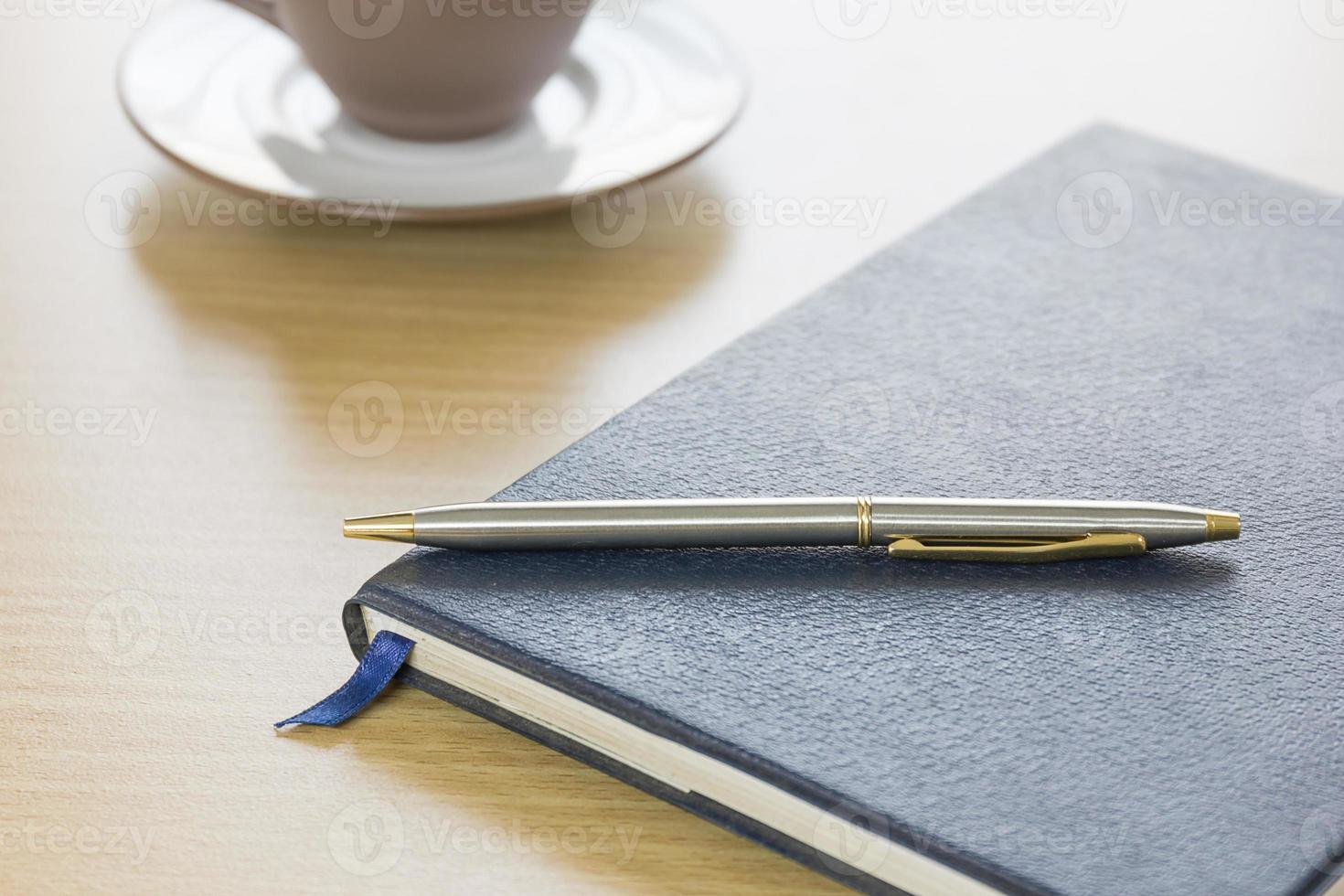Pen put on notebook 11388707 Stock Photo at Vecteezy