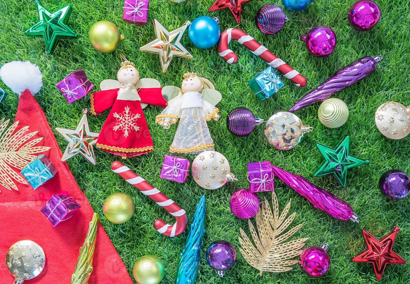 Top view Christmas decoration on green grass photo