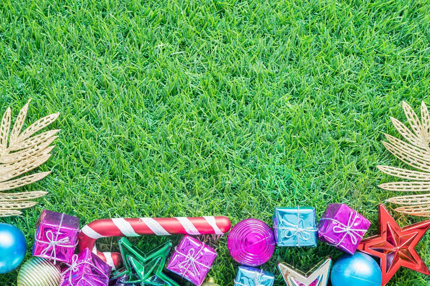 Christmas decoration on green grass with copy space photo