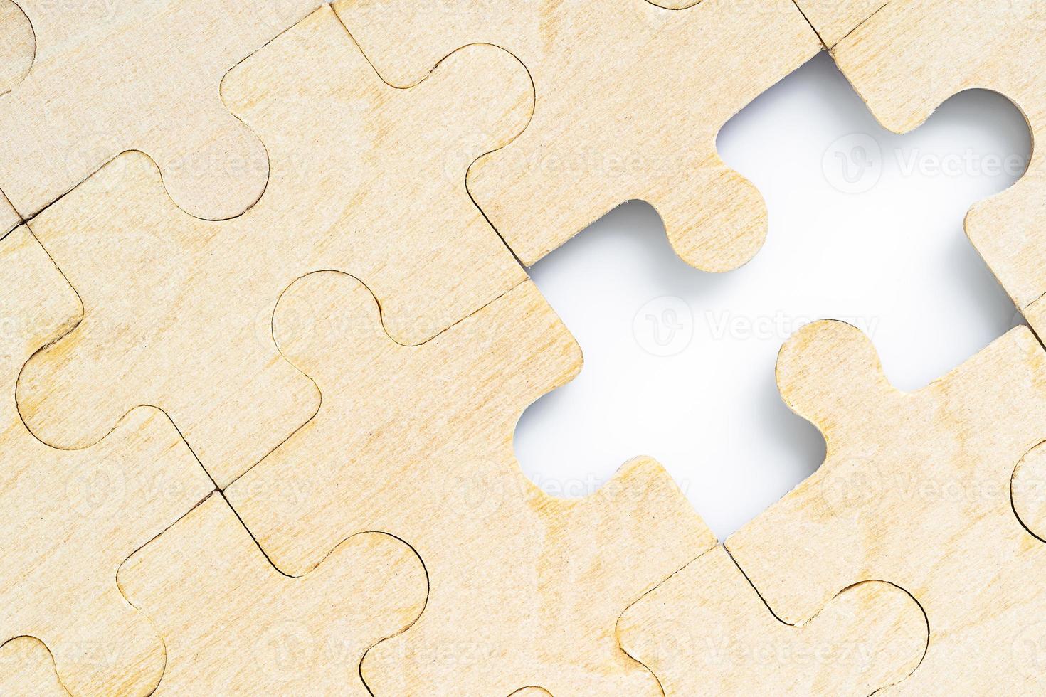 Missing jigsaw puzzle pieces on white photo